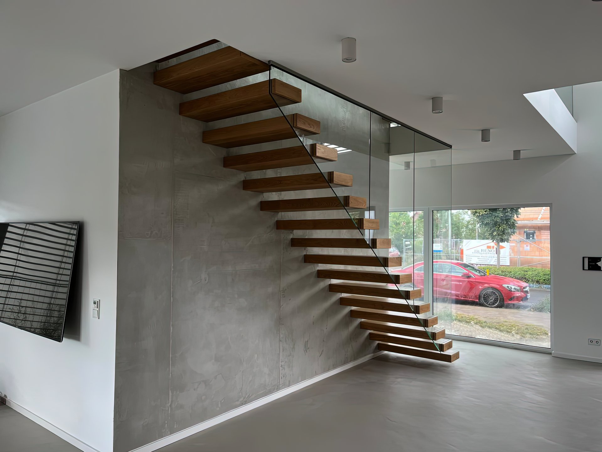 Massive Kragarmtreppe ohne Mittelholm – AN Treppenbau (Referenz 36)